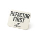 Naklejka Refactor First – winylowa matowa 70×50 mm